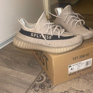 yeezy slate size 4.5 worn 3 times . don’t fit anymore
